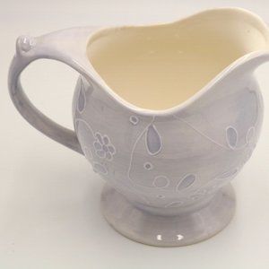 A sauce boat, gravy boat, or saucière light blue